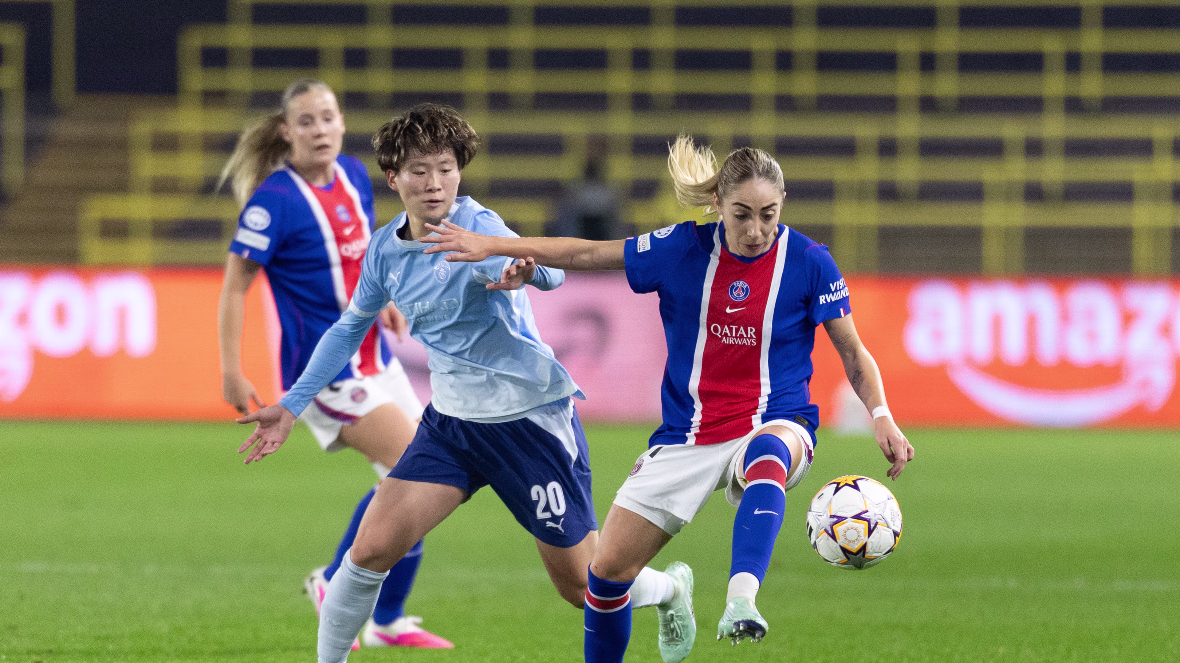 Olga Carmona battles with her opponent to keep the ball