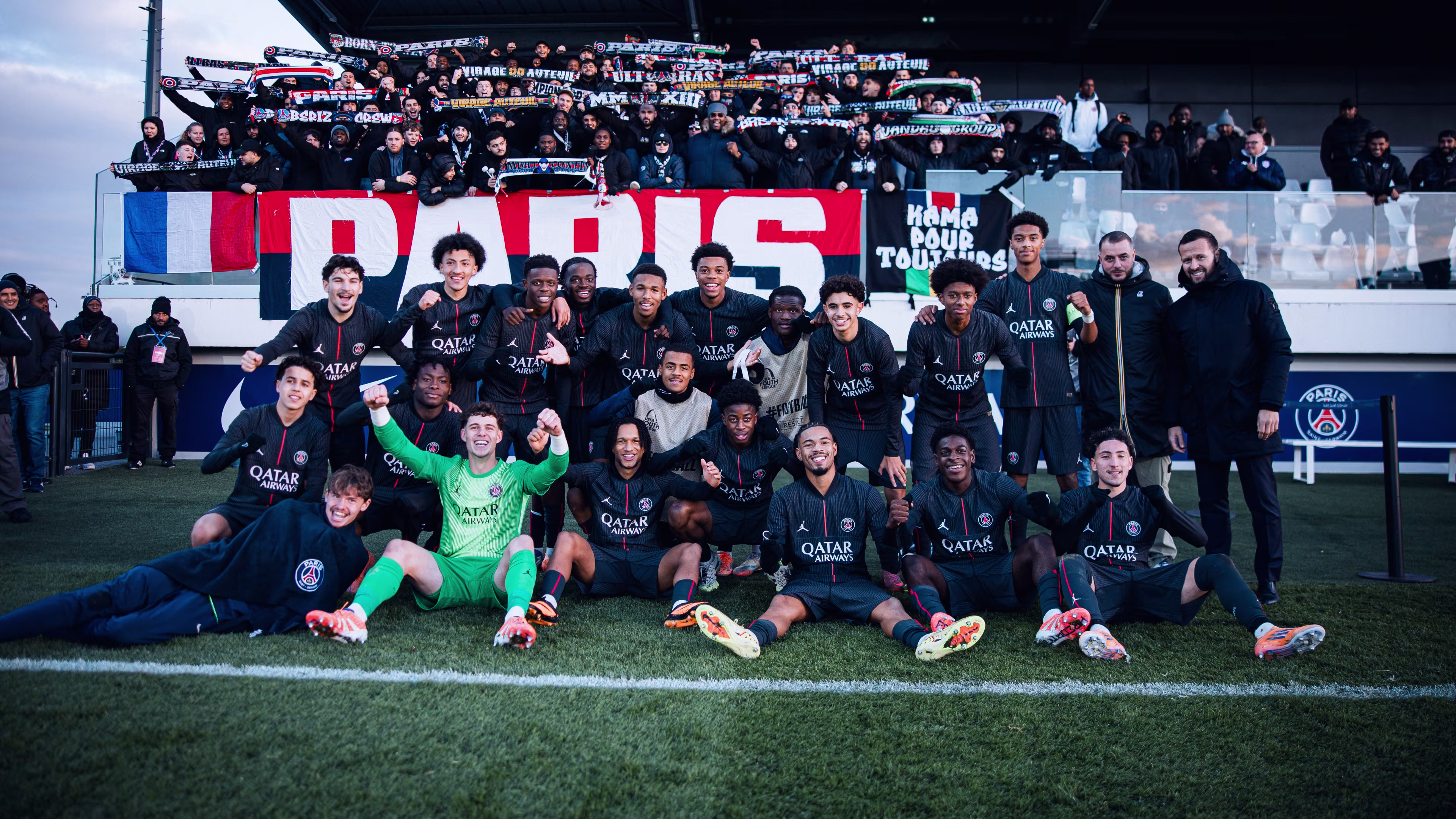The Paris Saint-Germain U19s celebrate their UYL qualification with the Ultras. 